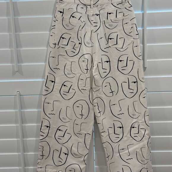 Shekou Denim - Shekou "Little Things" white denim jeans with a black abstract face print